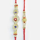 Red and Blue Stone Studded on Golden Base and Rhombus Shape Jewel Rakhis Set of 2 Rakhis