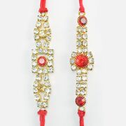 Red Stone Scattered in Mid of Shining Jewels Nice Looking Fine Work Rakhi Set of Brother Rakhis