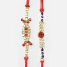 Oval, Shape Jewel Dazzling Rakhi and Red Stone in Mid of Elegant Jewels Rakhi Set of 2