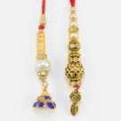 Blue Stones Studded and Golden Leaf Hanging Two Attractive Lumba Rakhis 