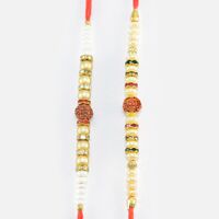 Rudraksha in Mid of Pearl and Beads Attractive Looking Rakhis Set