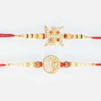 Jewel Studded Nice Looking Swastika and Om Golden Base Rakhi Set of 2