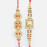 Red and White Stone Studded Golden Base Fine Work Fantastic Designer Rakhis Set of 2