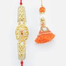 Bracelet Pattern Design Golden Color Brother Rakhi with Orange Shaded Nice Looking Lumba