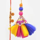 Simple New Designer Auspicious Sandalwood Rakhi with Eye Catching Beautiful Lumba Rakhi