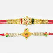 Amazing Om rakhi and Lotus And Studded Diamond Golden Bird Rakhi