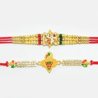 Amazing Om rakhi and Lotus And Studded Diamond Golden Bird Rakhi