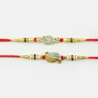 Om Designer Diamond Rakhi In Golden Color Pearls