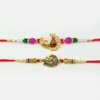 Traditional Designed Peacock Rakhi In Diamond