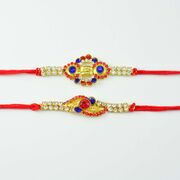 Pretty Designed Rakhi In Blue Diamonds
