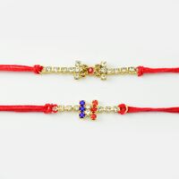 Mauli Rakhi In Red And Blue Diamonds