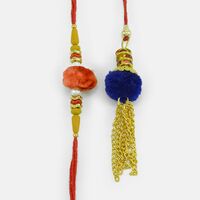 Set of Rakhi and Lumba Ornamented with Colorful Pom-Pom and Golden Chain for Bhaiya-Bhabhi