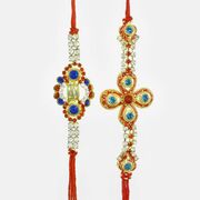 Mesmerizing Blue and Red Stone Studded Diamond Rakhi Set Enhanced Beauty with Rinestone Chain
