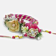 Pink Themed Rakhi Combo for Bhaiya and Bhabhi Beautify with different types of Flowers and Leafs