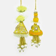 Yellow Shade of Lumba Sets for Bhabhi Stringed with Beads and Flower and eye-catching Latkans