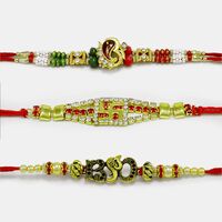 Beads and Diamonds Ganesha, Swatika and Om Rakhi Set of 3
