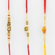 Graceful set of Ganesha and Om Rakhi Set of 3 Rakhi for Brother