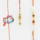 Pear Thread Rakhi with Lumba and a Kid Rakhi Set of 3 Rakhis.