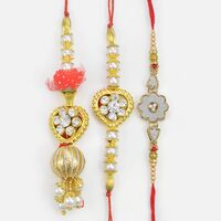 Heart Shape Pattern Bhaiya Bhabhi Rakhis Set with Floral Shape Extra Brother Rakhi