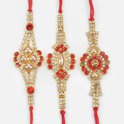 Cutting Pearl Studded in Mid of Jewel Shining Diamond Rakhi Set of 3