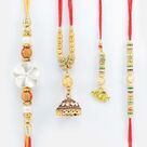 Flower and Jewel Pattern Two Brother Rakhis with Meena Work and Heart Shape Lumba Rakhis Set