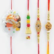 Flower Shape and Meena Work Kundan Dotted Two Brother Rakhis with Lumba and Ganesha Kid Rakhis
