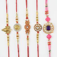 Golden Ganesha And Floral Rakhi Set 