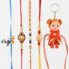 Beautiful Doll and Golden Rakhi Set 