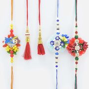 2 Zardosi and 2 Red Lumba Rakhi Set with 1 Kid Rakhi Set of 5 Rakhis
