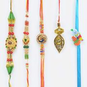 Auspiciois Krishana and Ganesha 4 Rakhis Set with 1 Lumba Rakhi
