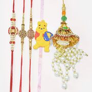 Jewels Om and Veera Written Rakhis for Brother with Beautiful Lumba Rakhi and Pooh Kid Rakhi