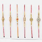 Dazzling Set of 6 Rakhis with Studded Pearl and Sliver Color Rakhi.