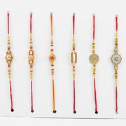Dazzling Set of 6 Rakhis with Studded Pearl and Sliver Color Rakhi.