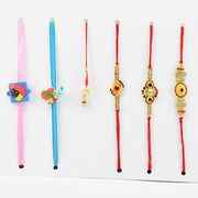 Simple But Beautiful Set of 6 Rakhis for 3 Brother and 2 Kids with a Lumba Rakhi.