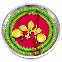 Small Ganesha Below Golden Leaf on Pink Color Base Rakhi Puja Thali