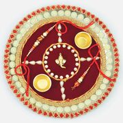 Ganesha In Mid of Design Maroon Base Auspicious Pooja Thali with Brother and Bhabhi Rakhi