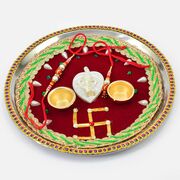 Shri Ganesha and Swastika On Maroon Fabric Base Puja Thali for Rakhi festival
