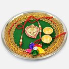 Awesome Looking Lord Ganesha On Green Base Design Flower Rakhi Pooja Thali