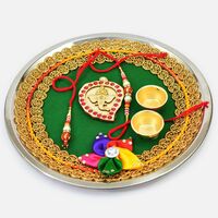 Awesome Looking Lord Ganesha On Green Base Design Flower Rakhi Pooja Thali
