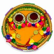 Traditional Rakhi Pooja Thali Decorated with Five Colorful Petal Flowers and Pom-Poms