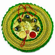 Green and Golden Themed Rakhi Pooja Thali Adorned with Ganesha and Mor Pankh