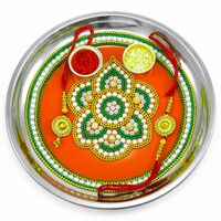 Uniquely Designed Center on Orange Painted Rakhi Pooja Thali