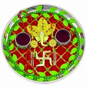 Velvet Red Base Ganesha and Swastika Rakhi Pooja Thali