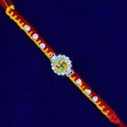 Jewel Studded Swastika Sacred Mauli Thread Pure Silver Rakhi
