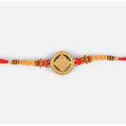 Round Shape Lord Ganesha Sandalwood Rakhi with Beads