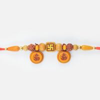 Simple Divine Swastika in Mid with Om Written on Sandalwood Special Brother Rakhi