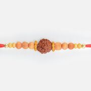 Sacred Rudraksha in Mid with Sandalwood Beads Designed Thread Bhai Rakhi