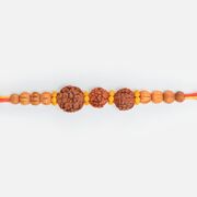 Auspicious Three Rudraksha Liner Marvelous Looking Sandalwood Rakhi for Bhai