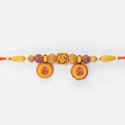 Divine Om Written Liner Rudraksha Rakhi with Sandalwood Beads