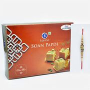 Ek Omkar Ganesha Rakhi with Delicate Kanha Soan Papdi